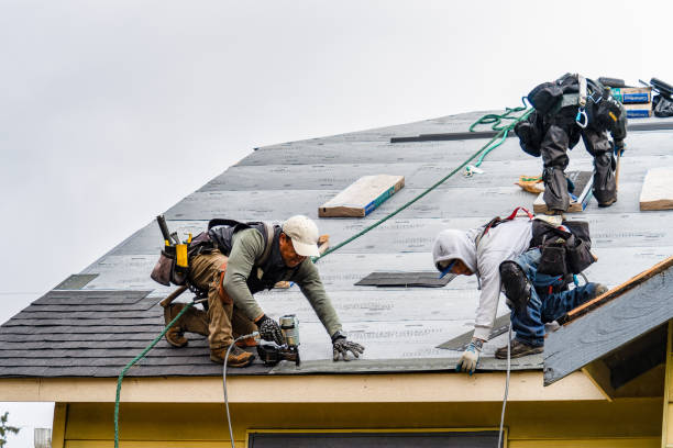 Professional Gutter Installation technician working in Byron, NY